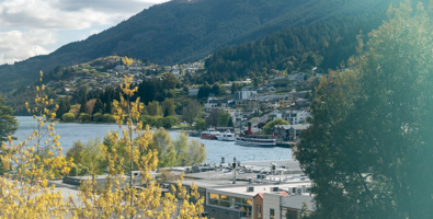 Photo of Queenstown looking across Lake Whakatipu at the TSS Earnslaw