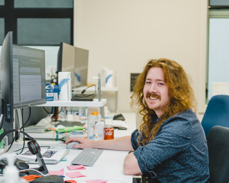A man at his desk.
