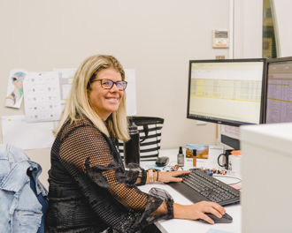 Woman working at a computer