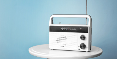 Retro battery-powered radio on a stool