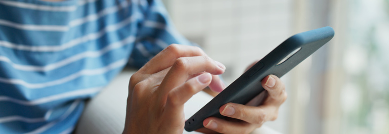 Female using a smart phone. 